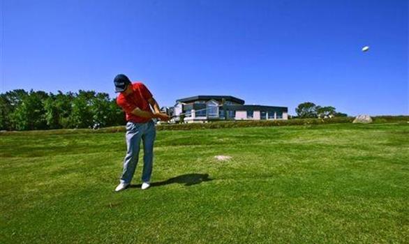 Golfer en Bretagne près de Perros-Guirec - Stereden, Village de Chalets